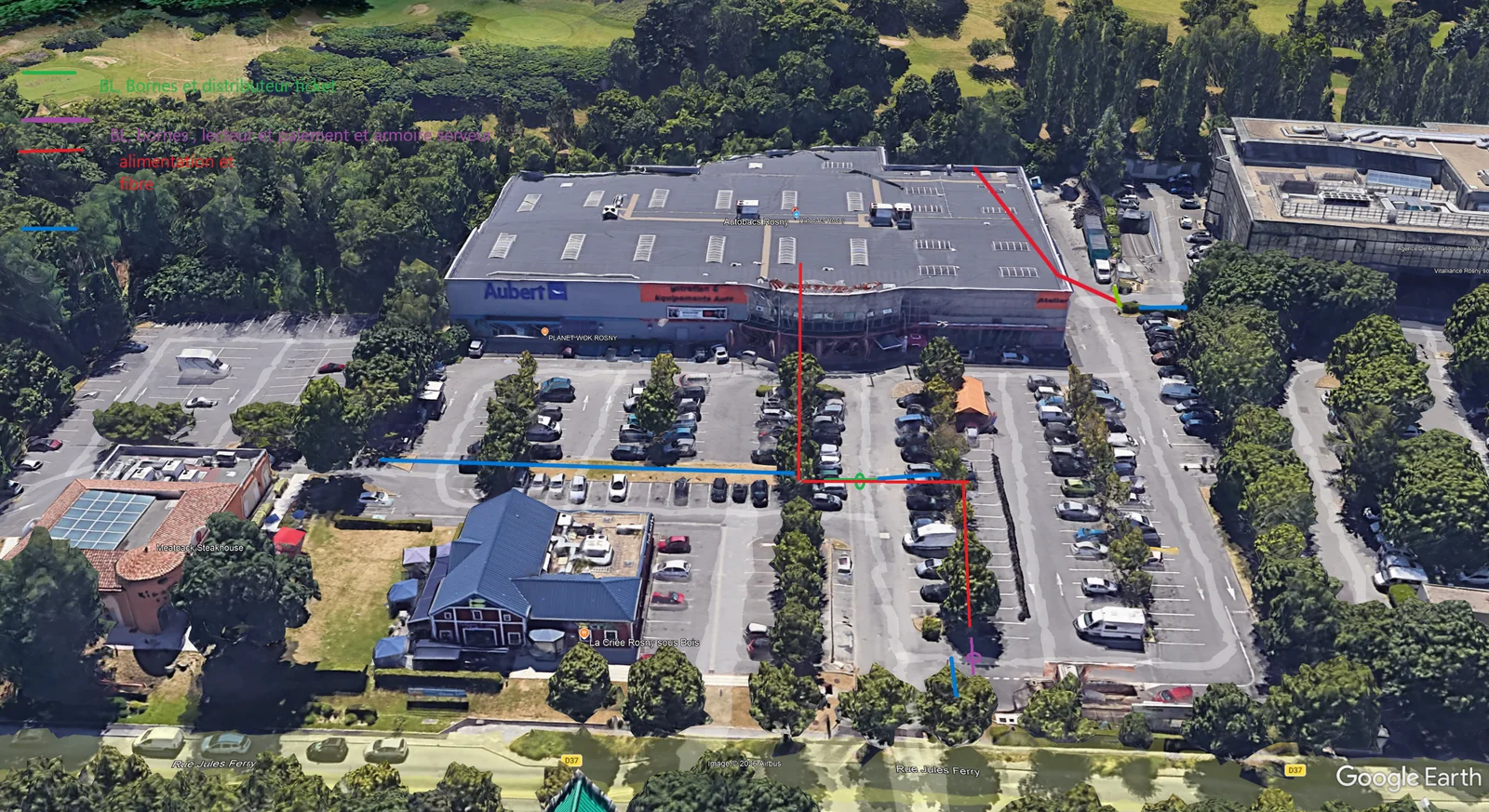Schéma du plan de circulation d'un retail park à Rosny-sous-Bois (93) : entrée et sortie à sens unique, barrières levantes, bornes et paiement du parking